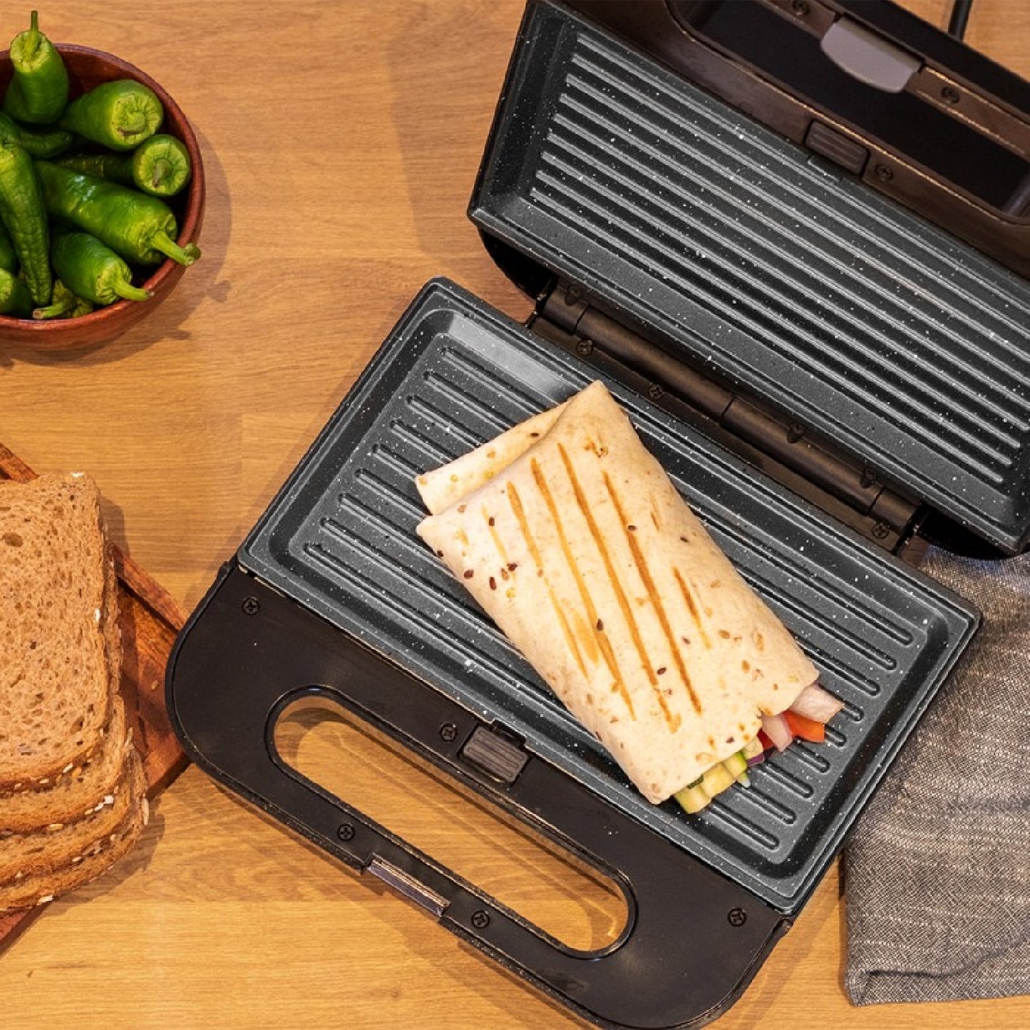 Sandwichera Rock'ntoast 3-in-1 Square, Capacidad 2 Sándwiches, Acabados En Acero Inoxidable, 3 Placa Desmontables E Intercambiables, Revestimiento D_3